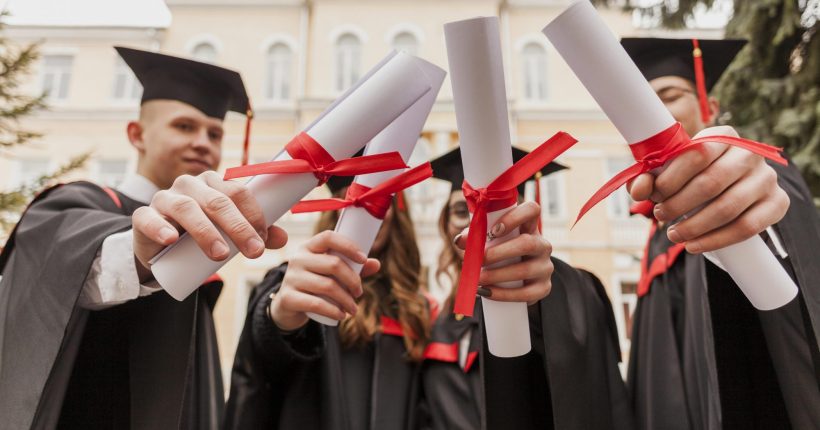 young-students-holding-diploma-e1607504563642
